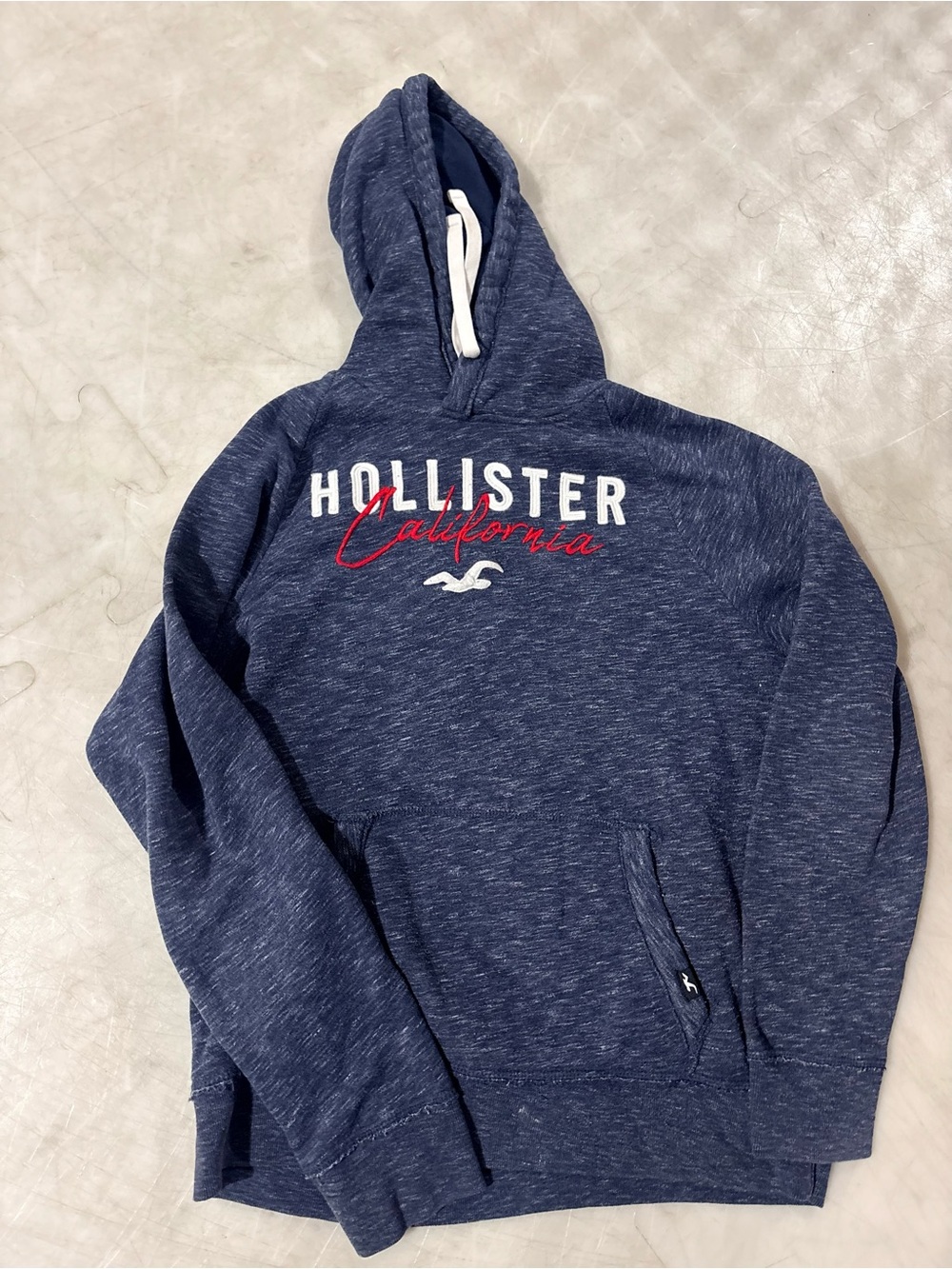 Hollister Men's Heather Navy Pullover Hoodie with Red Script